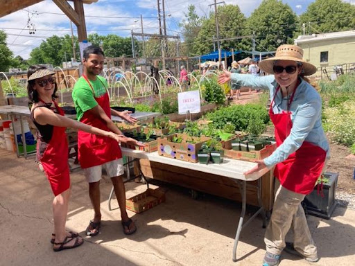 Denver volunteers showing off plants at Denver Swap